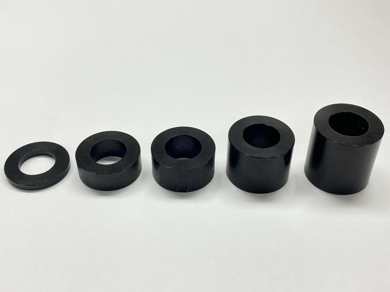 1" OD x 9/16" ID Aluminum Black Spacers